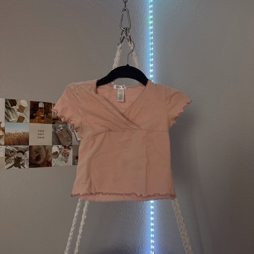 pink frilled top